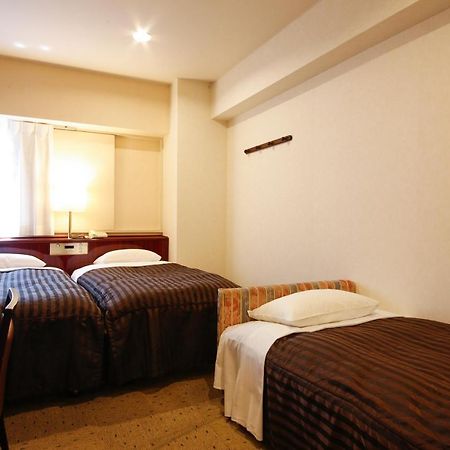 Hotel Sunlife Ōsaka Extérieur photo