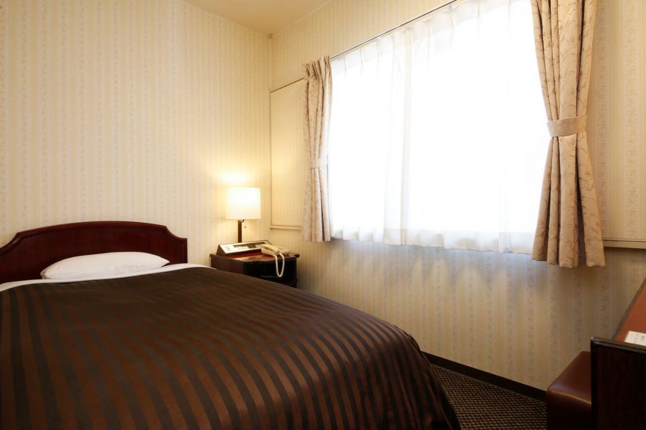 Hotel Sunlife Ōsaka Extérieur photo